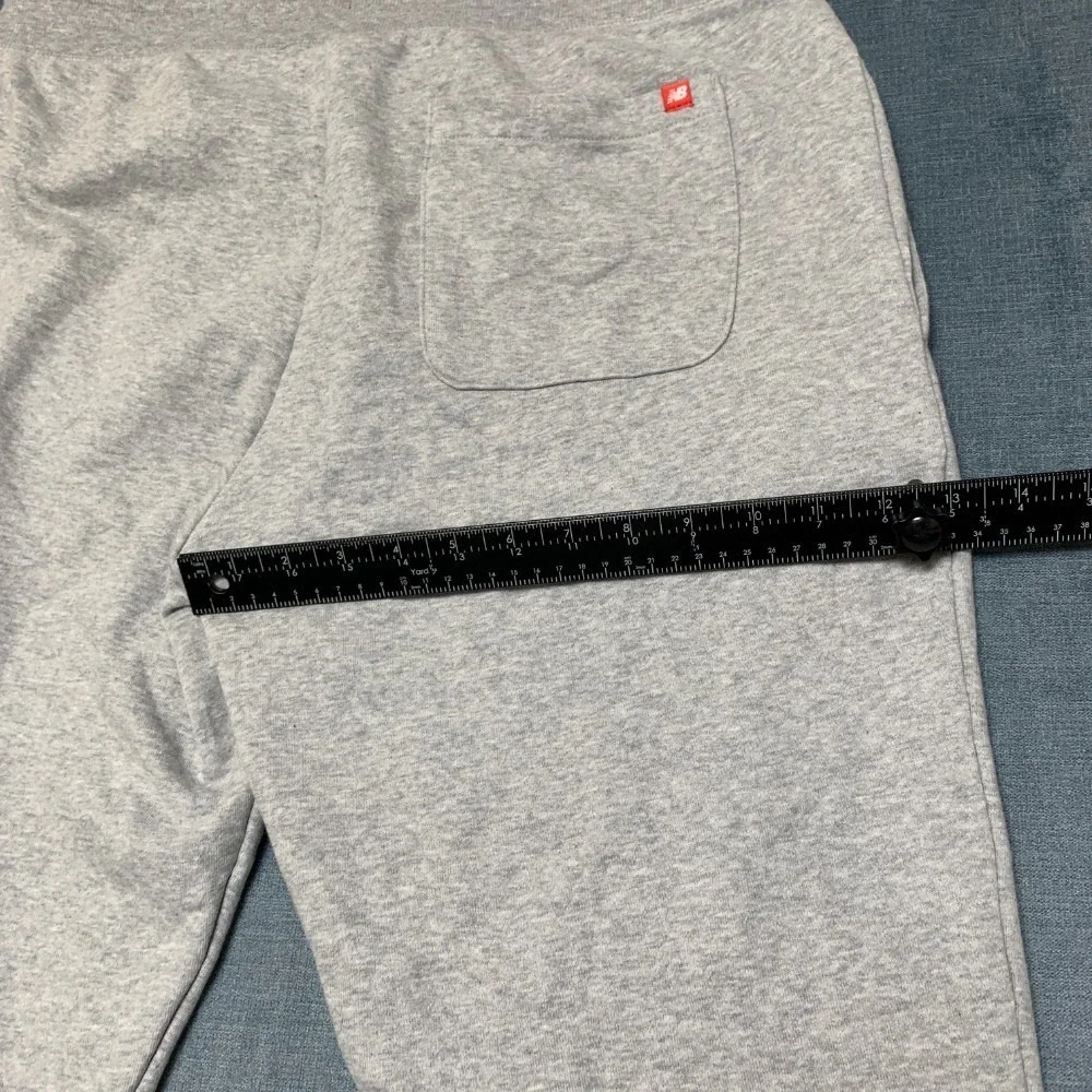 New Balance Jogger Pants Men Large Heather Gray Wordmark Logo Drawstring Tapered